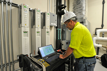 ESIS technician working on a building automation installation